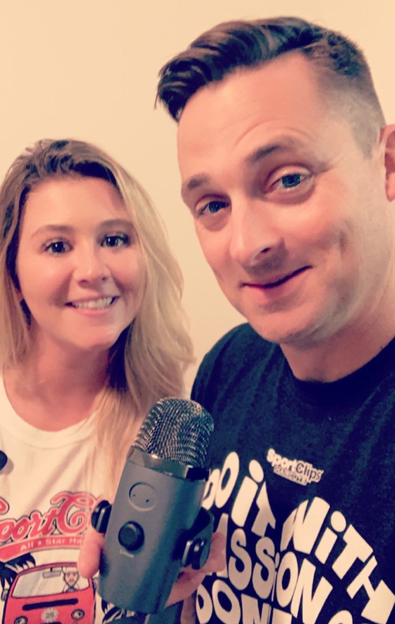 Chad Jordan and Maria Jones holding a microphone
